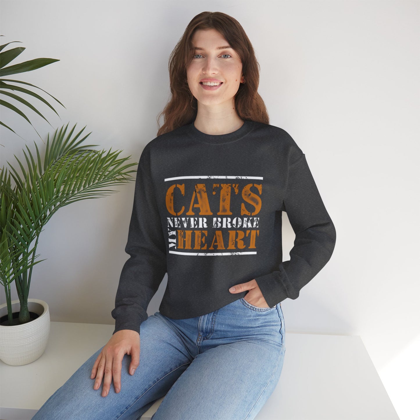 CATS NEVER BROKE MY HEART Unisex Crewneck — loud love, zero heartbreak, all paws